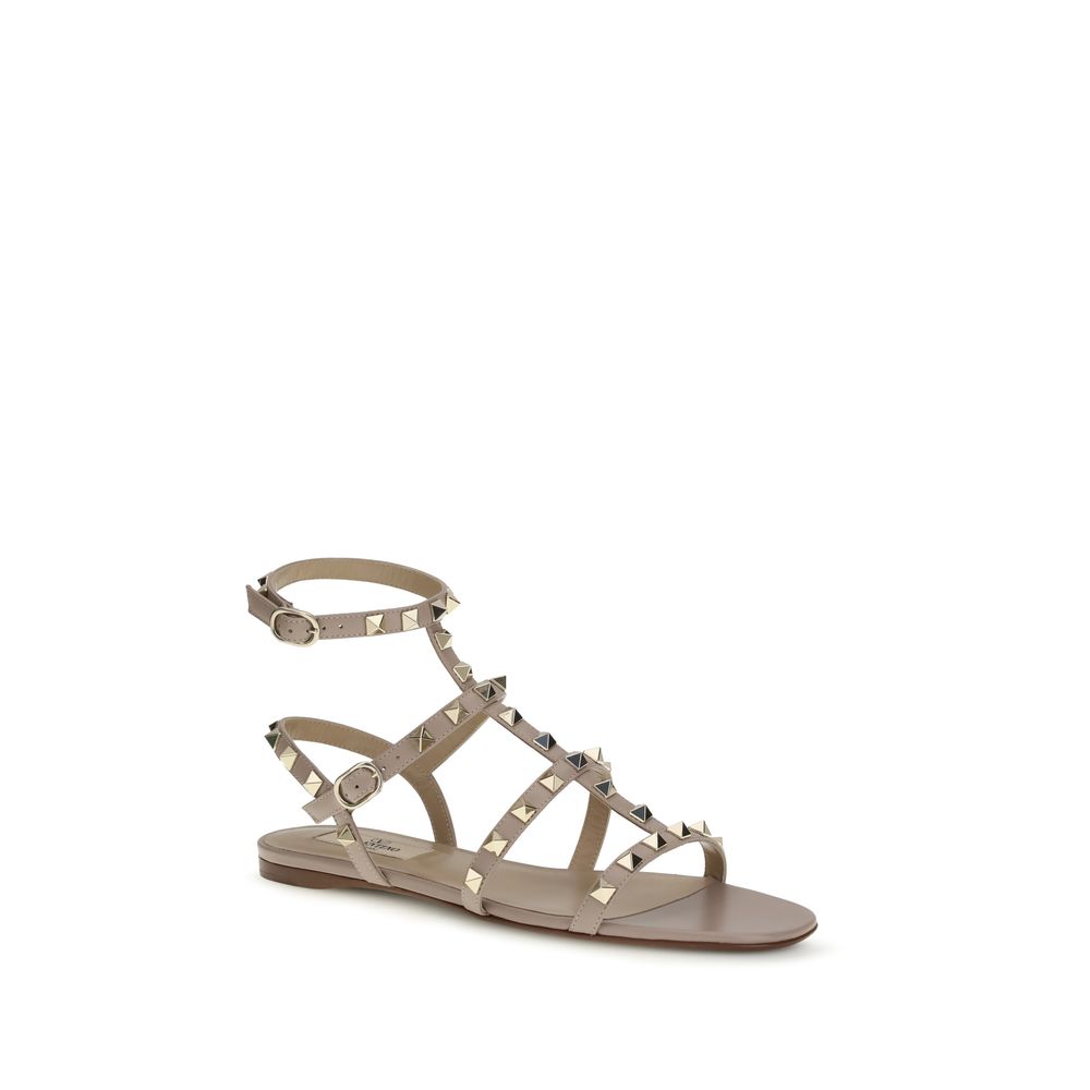 Valentino Garavani Rockstud Flat Leather Sandals in Beige | AW26
