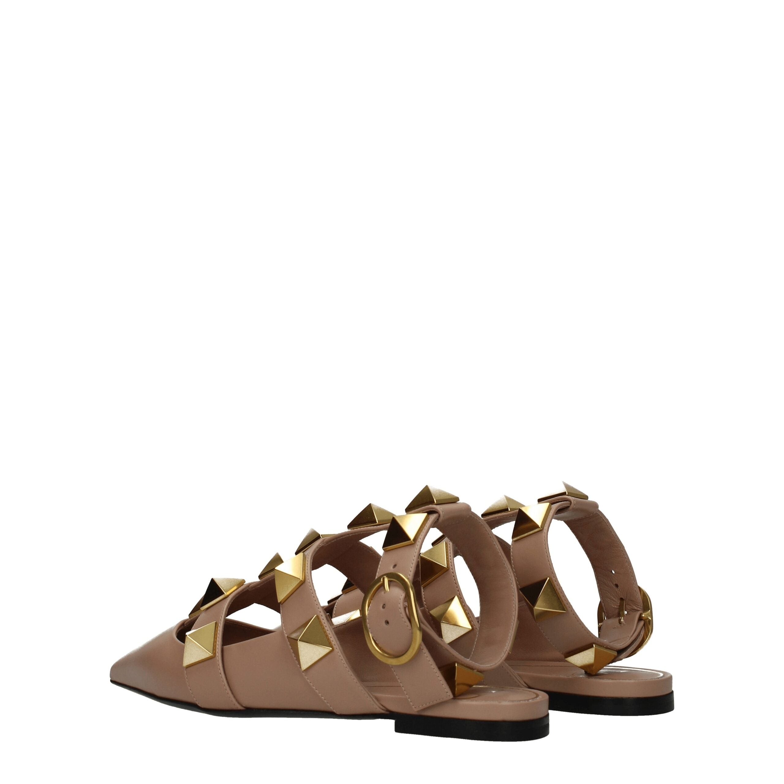 Valentino Garavani Roman Stud Flat Sandals in Nude Leather with Gold Studs