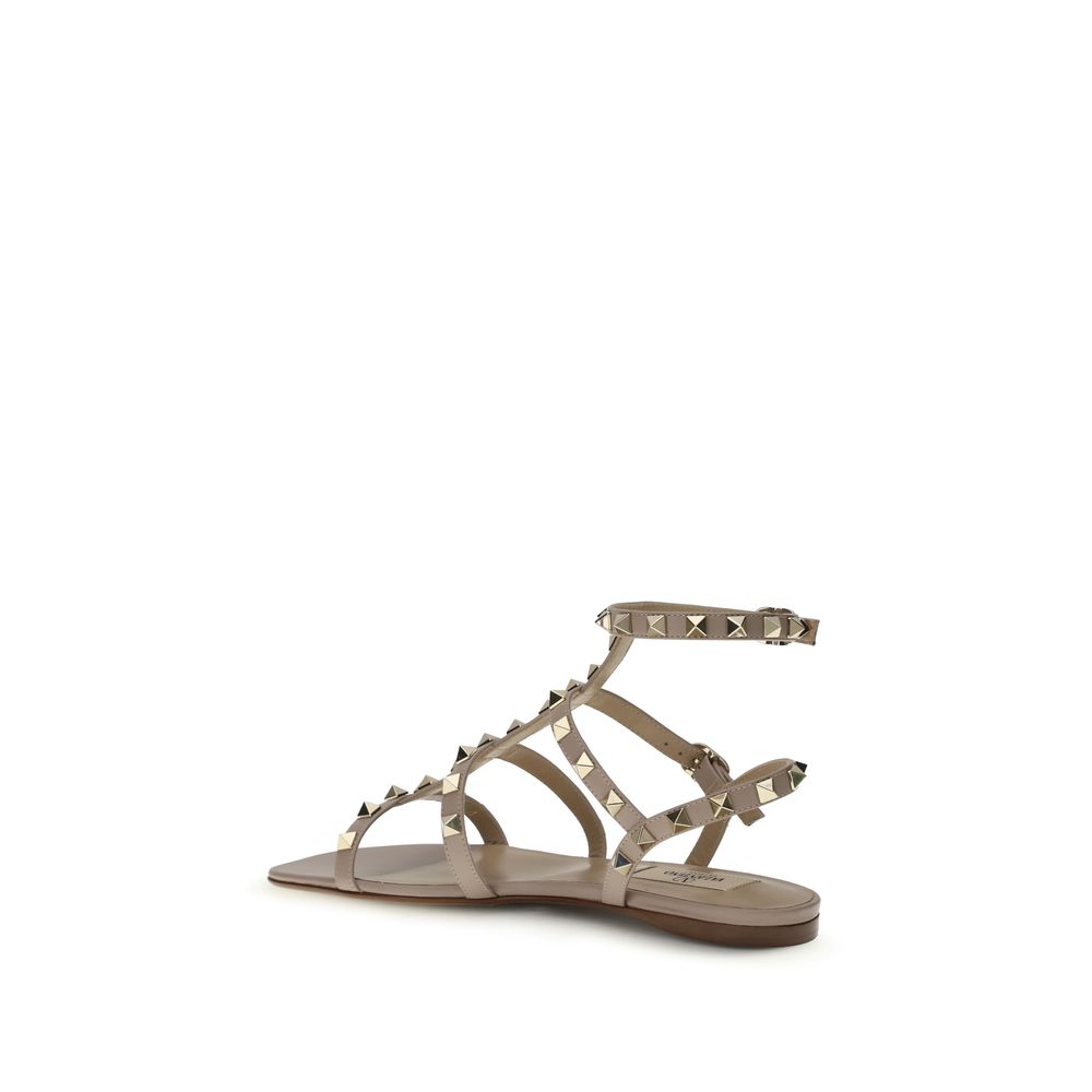 Valentino Garavani Rockstud Flat Leather Sandals in Beige | AW26