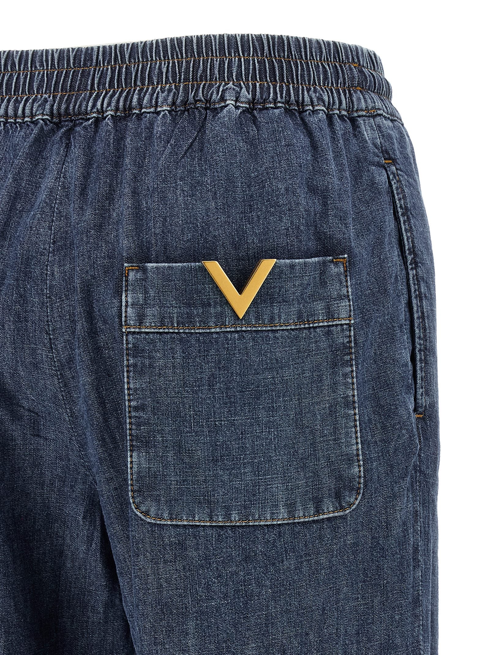 Valentino Garavani Wide Flared Denim Jeans in Blue | Made in Italy